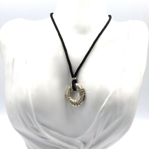 Tiffany & Co. Jewelry - Tiffany & Co Atlas circle pendant on black cord necklace